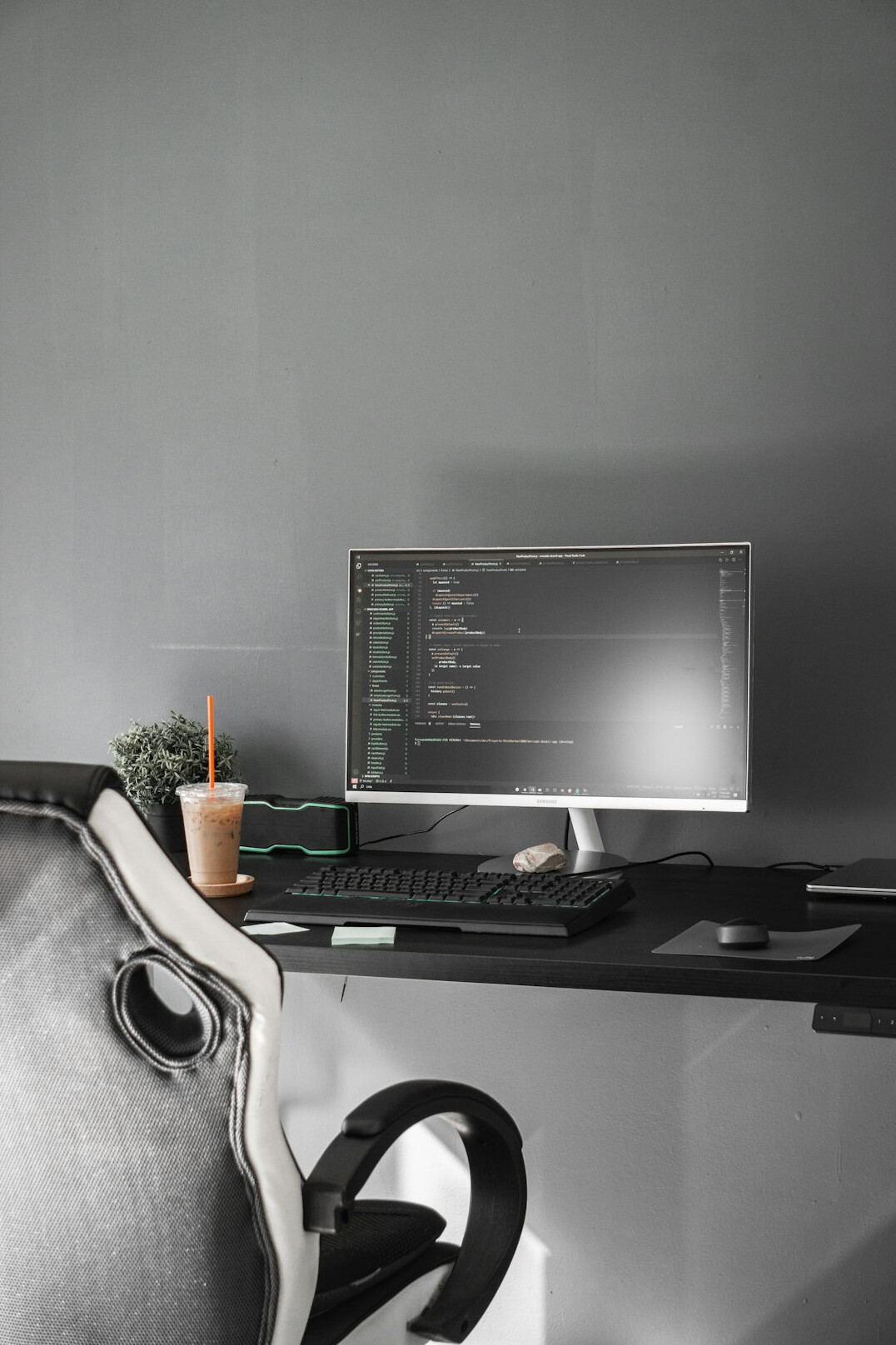 programmer coding at desk